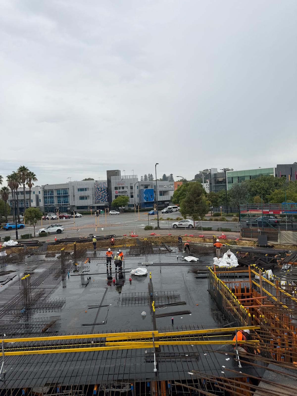 Large commercial foundation slab with reinforcing steel and black membrane